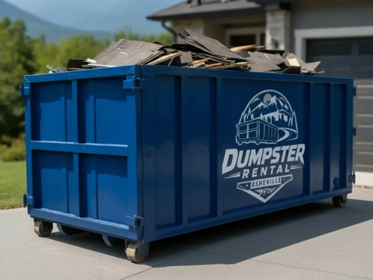 Dumpster with storm debris and yard waste in Asheville NC