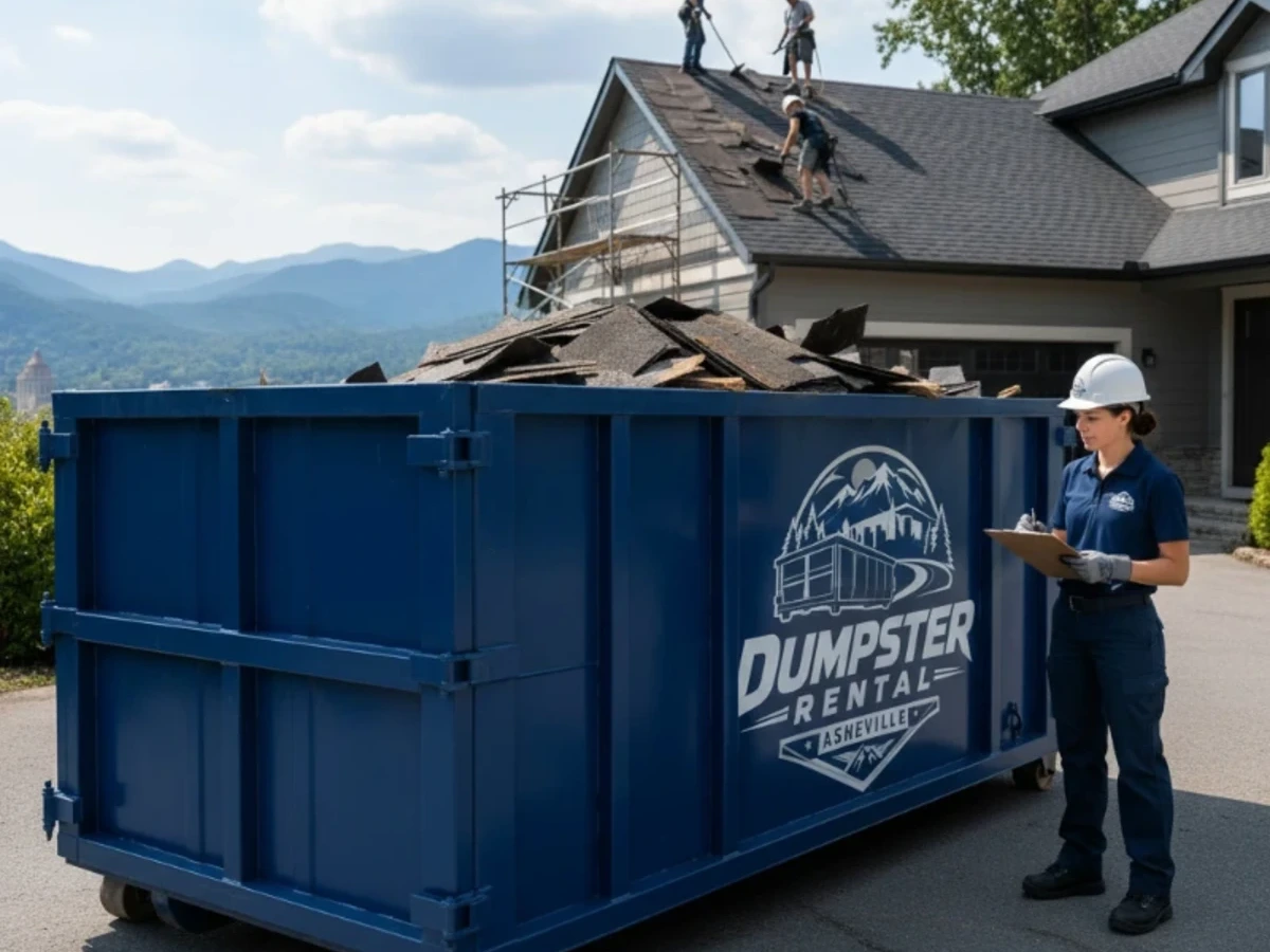 Roll-off dumpster filled with roofing tear-off shingles in Asheville