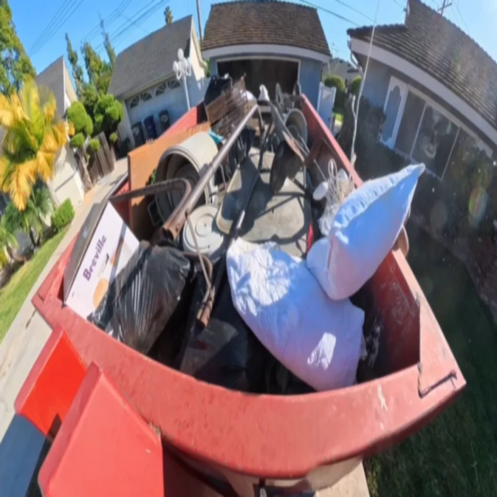 Blue roll-off dumpster staged for delivery — dumpster rental serving Clyde, NC